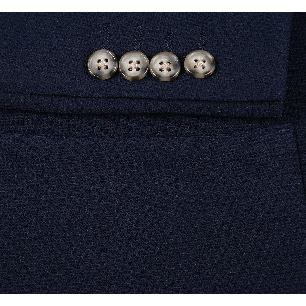 The Pellagio Men's Half Canvas Blazer Navy PS25-17, a single-breasted jacket with notched lapel and two buttons, is styled with a white dress shirt, patterned beige tie, and colorful pocket square on a display mannequin.