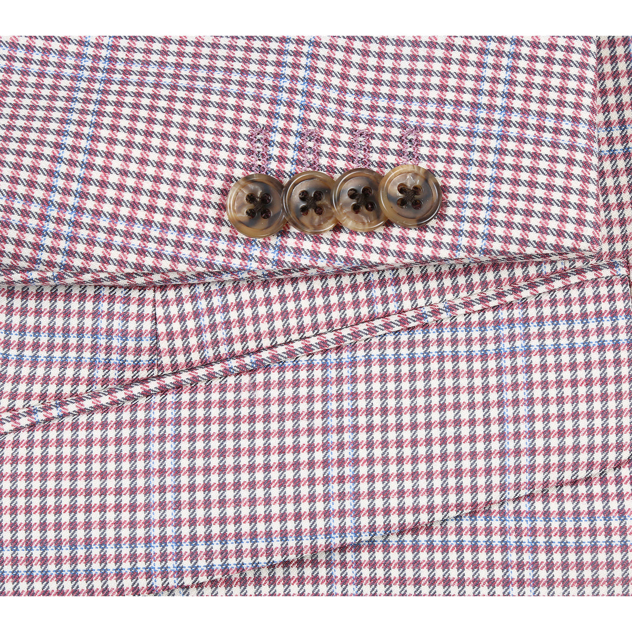 A mannequin displays the Alessandro Vitello by Renoir Slim Fit Wool Blazer in pink, crafted from 100% wool. It's styled with a white shirt, patterned black tie, and highlighted by a teal pocket square.