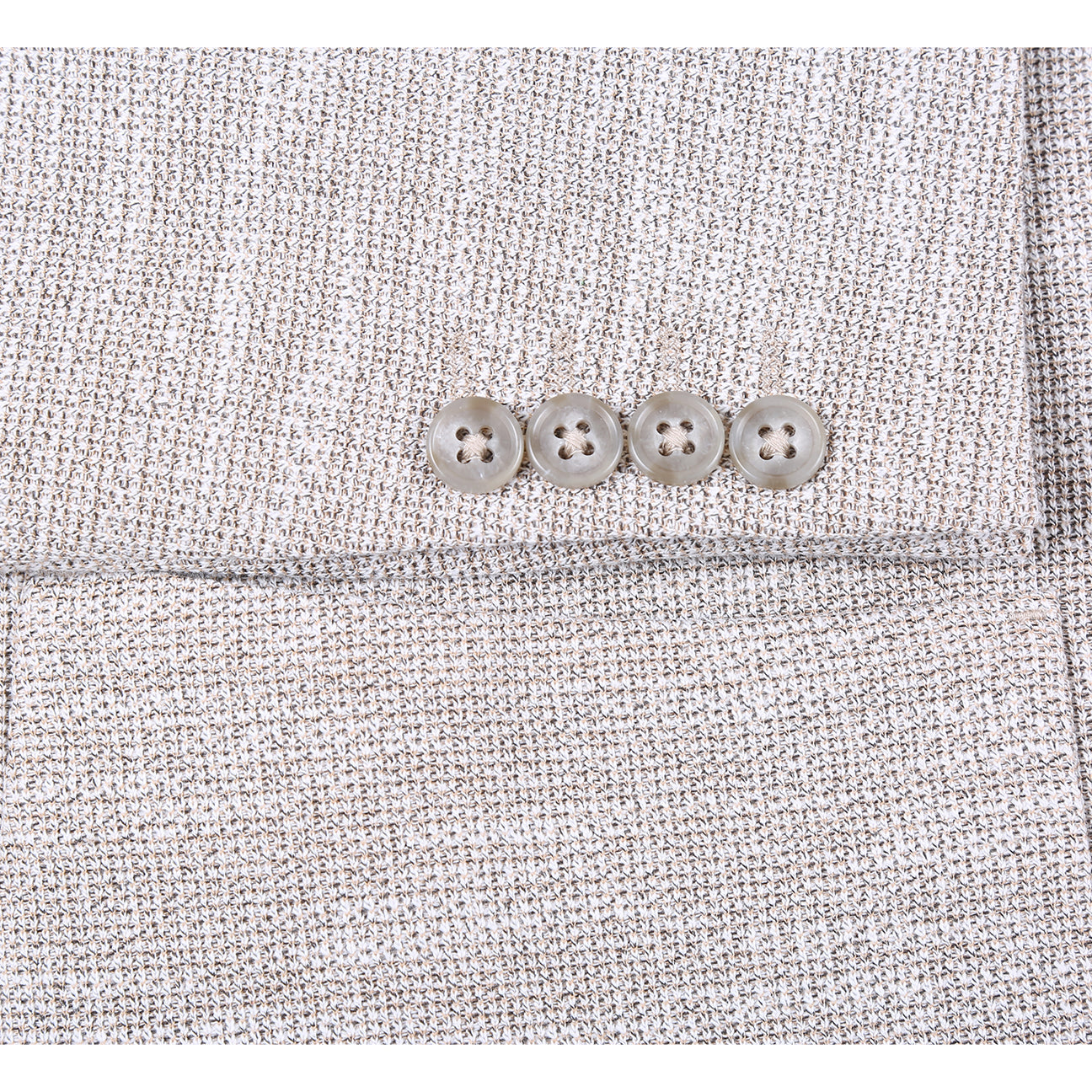 The Pellagio Camel Men's Slim Fit Riserva Jacket PS26-10 features textured fabric, notch lapels, two buttons, front pockets, and comes with a brown pocket square, shown over a white shirt and patterned dark tie on a mannequin.