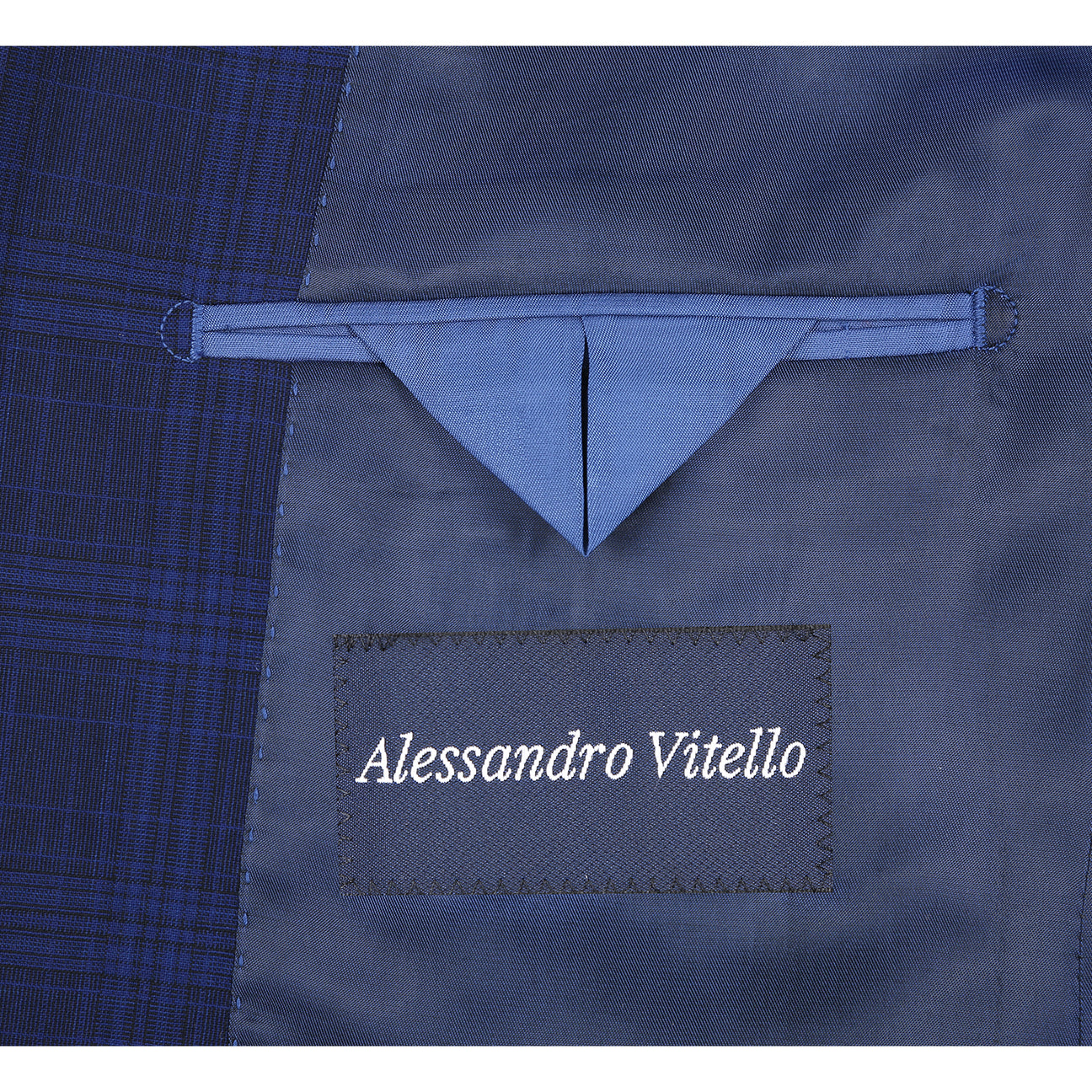 The Alessandro Vitello by Renoir New Slim Fit Wool Blue Suit 566-7 is displayed on a mannequin, styled with a white dress shirt and a maroon patterned tie.
