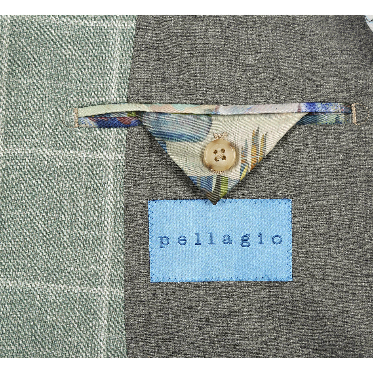 The Pellagio Men's Half Canvas Blazer Green PS25-5, by Pellagio, is shown on a mannequin with a notched lapel, white shirt, striped brown tie, and patterned pocket square.