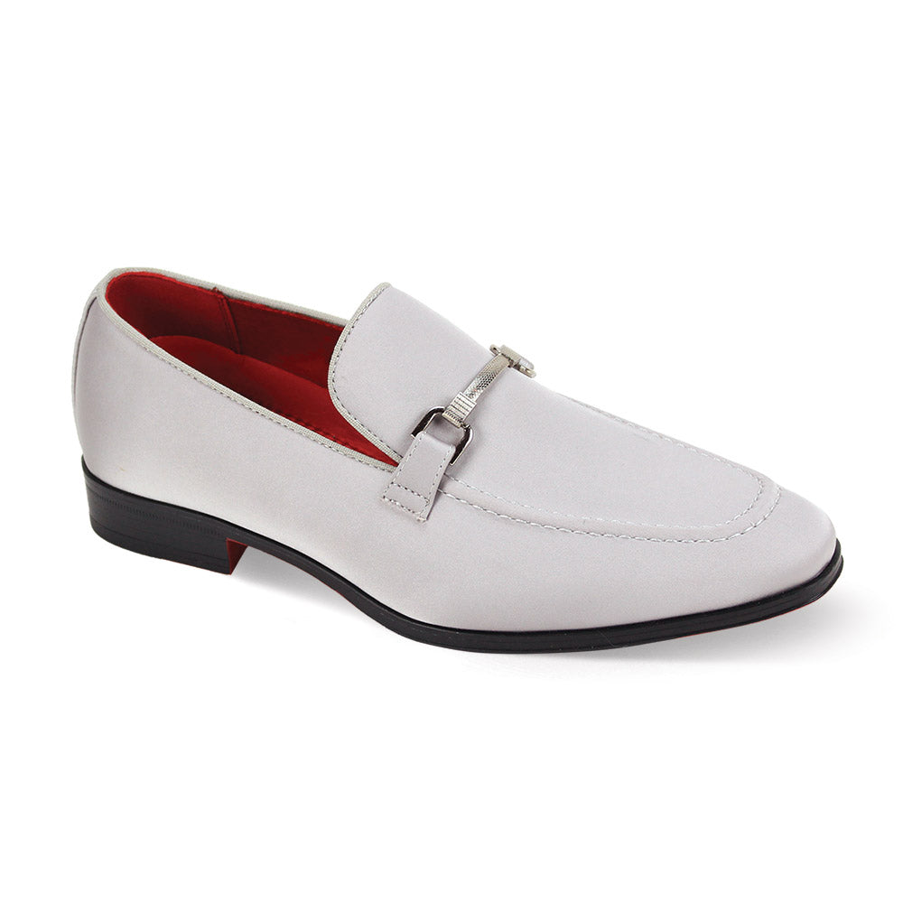 The After Midnight 7018 Silver Satin Loafer by AFTER MIDNIGHT boasts a sleek buckle detail, red interior lining, and black sole.