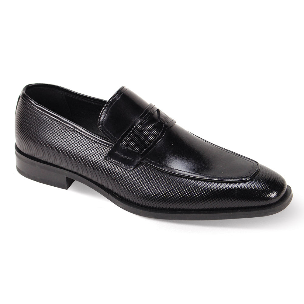 The Giorgio Venturi Giorgio 7043 Black Leather Shoes are single penny loafers with a moc toe, side textured detailing, strap accent, and low heel.