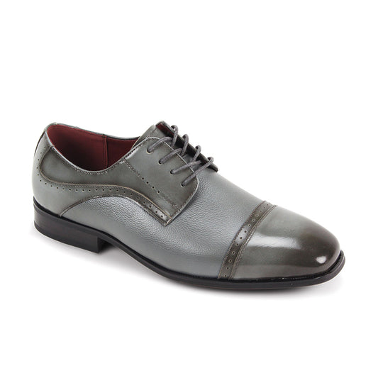 The Giorgio Venturi Giorgio 7076 Grey Leather Shoe is a genuine leather oxford with black laces, decorative perforations, and a low black heel, shown against a white background.