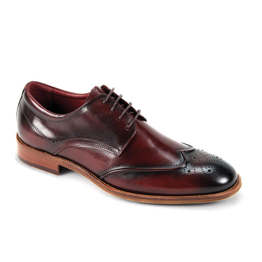 The Giorgio Venturi Giorgio 7077 Burgundy Leather Shoes feature classic wingtip brogue details, a lace-up closure, and a low wooden heel, shown against a white background.