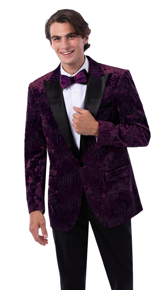 A man wears the EJ SAMUEL Purple Blazer J207 with black lapels, a matching bow tie, and black pants, smiling while standing against a plain background.