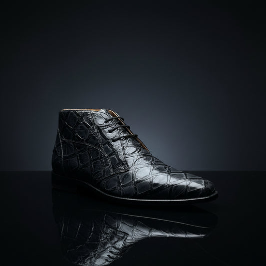 A single Belvedere Shoe 9 clearance dress boot in grey/black, featuring a crocodile skin pattern and displayed against a dark background. Brand: BELVEDERE. Size 9 only. FINAL SALE—NO EXCHANGE, NO RETURN.