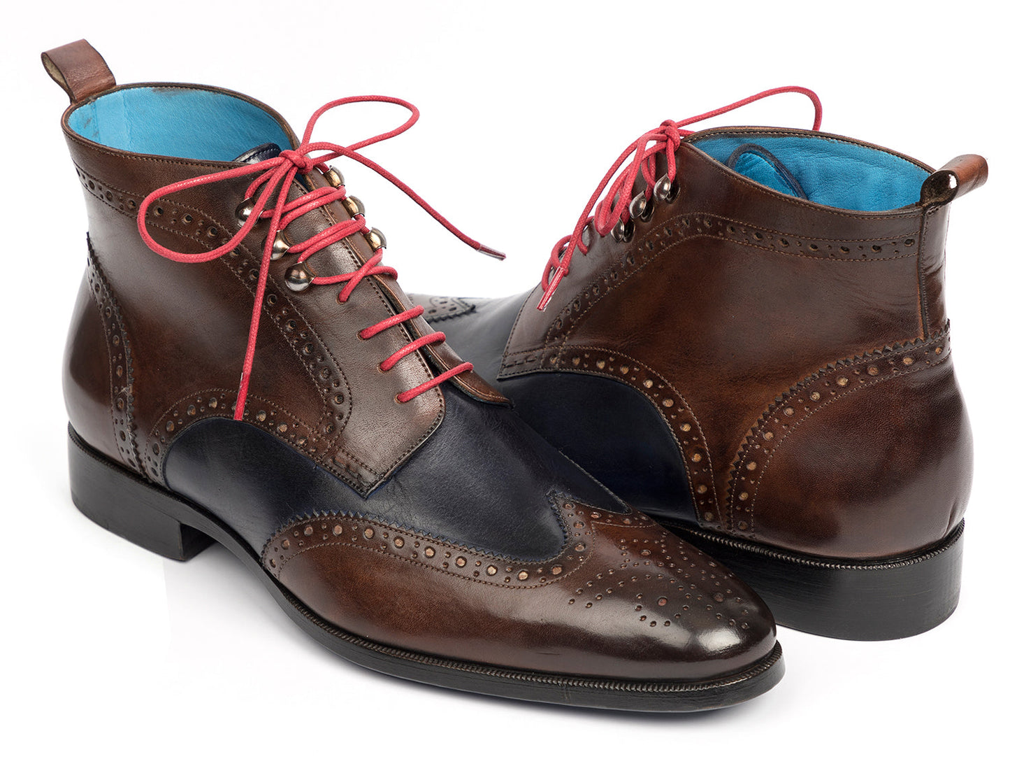 The Paul Parkman Wingtip Ankle Boots Dual Tone Brown & Blue (777-BRW-BLU) feature brown and navy leather with pink laces and decorative perforations, shown on a white background.