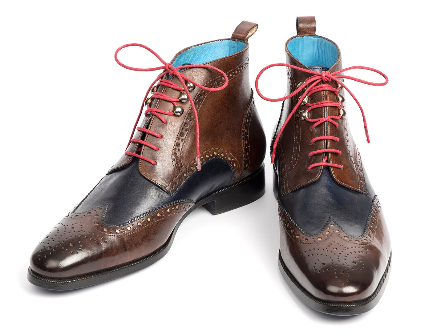 The Paul Parkman Wingtip Ankle Boots Dual Tone Brown & Blue (777-BRW-BLU) feature brown and navy leather with pink laces and decorative perforations, shown on a white background.