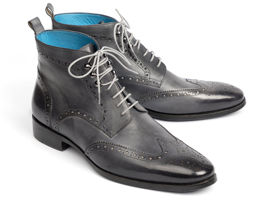 The Paul Parkman Wingtip Ankle Boots Gray Hand-Painted (777-GRAY) feature black hand-painted leather, light gray laces, and a blue inner lining, shown on a white background.