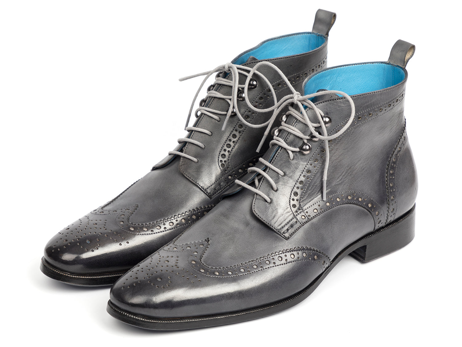The Paul Parkman Wingtip Ankle Boots Gray Hand-Painted (777-GRAY) feature black hand-painted leather, light gray laces, and a blue inner lining, shown on a white background.