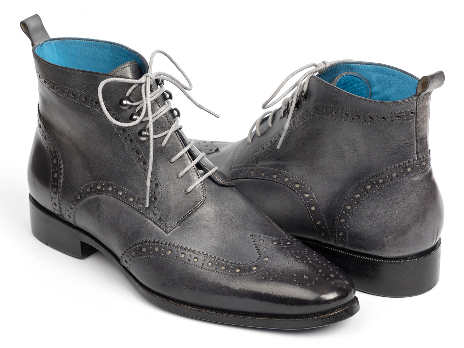 The Paul Parkman Wingtip Ankle Boots Gray Hand-Painted (777-GRAY) feature black hand-painted leather, light gray laces, and a blue inner lining, shown on a white background.