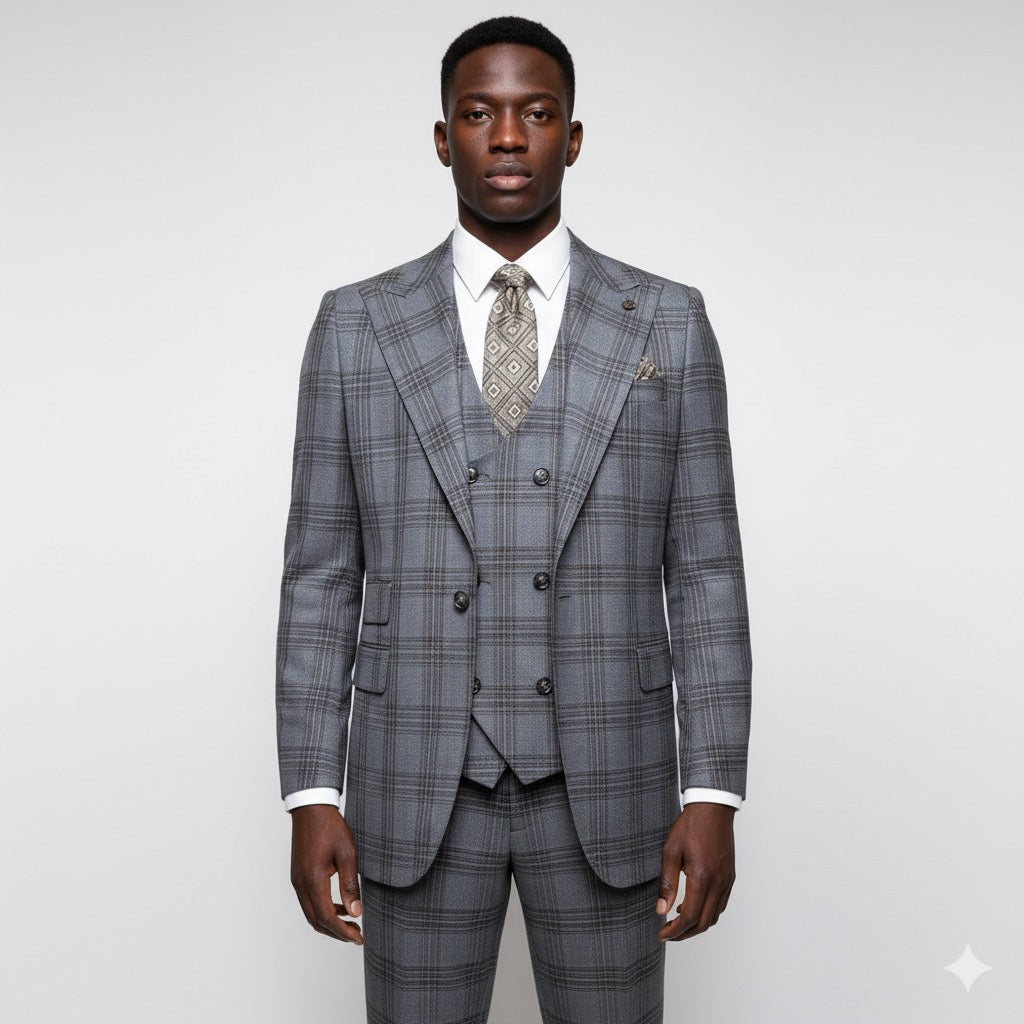 A man faces forward in a Tiglio Rosso Orvietto Grey Plaid TL7527 suit, styled with wide leg pants and a patterned tie, set against a plain light background.