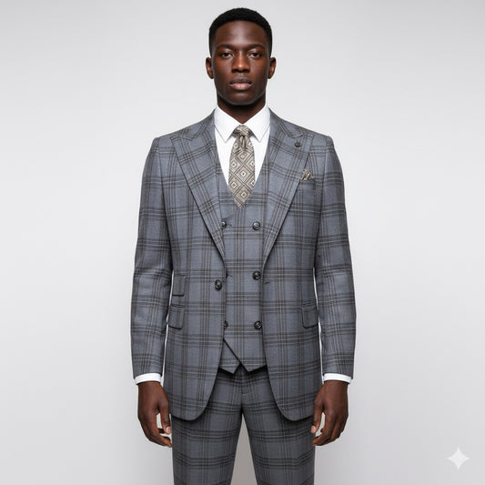 A man faces forward in a Tiglio Rosso Orvietto Grey Plaid TL7527 suit, styled with wide leg pants and a patterned tie, set against a plain light background.