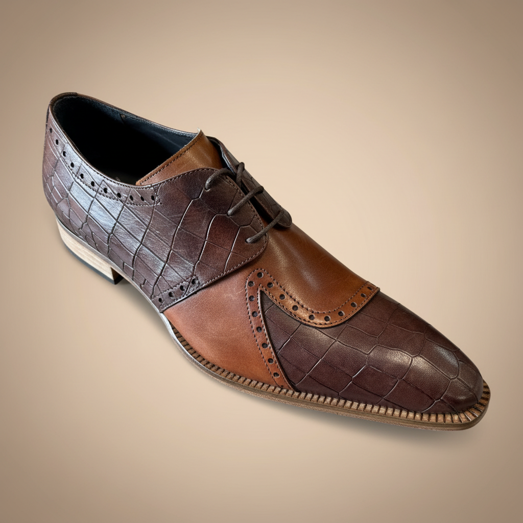 The Duca Di Matiste Valentano Brown Shoes feature a men's lace-up design, expertly crafted in Italy from smooth tan leather and luxurious dark brown croco leather. The pair is pictured on a grey wood-grain surface. (IN STORE) (FINAL SALE) (SIZE 9 ONLY).