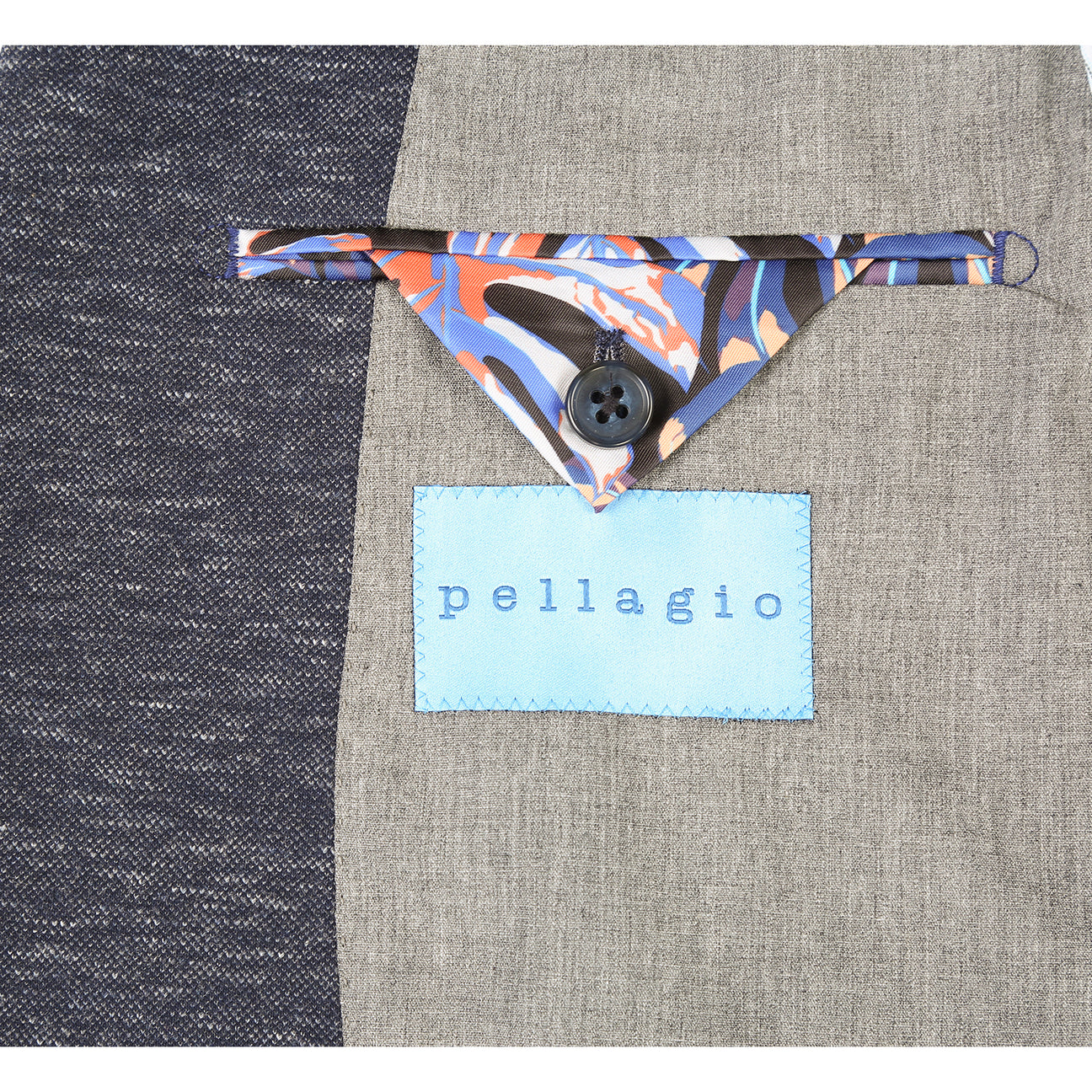 The Pellagio Men's Half Canvas Blazer Gray Blue PF24-1, a slim fit with notched lapel, is showcased on a mannequin with a white shirt, striped tie, and colorful pocket square.