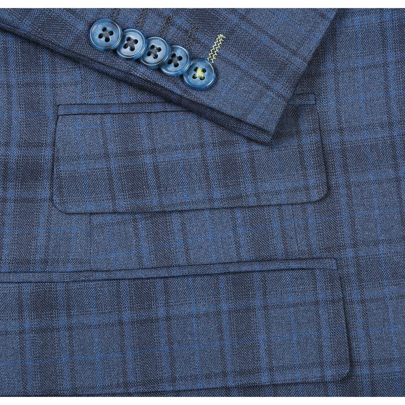 The mannequin is adorned with the ENGLISH LAUNDRY Cadet Blue Check Suit 92-53-095EL, a stylish offering from English Laundry, complemented by an immaculate white shirt and a striped tie. Its elegant peak lapels bring an air of sophistication to the ensemble.