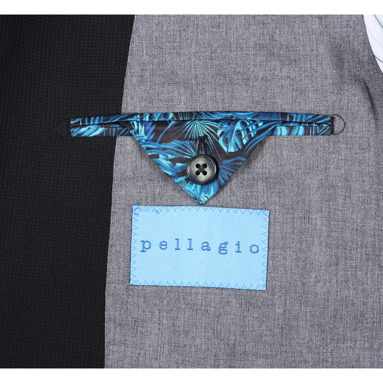 The Pellagio Men's Half Canvas Blazer Black PS25-18, a slim-fit single-breasted jacket with notched lapel, is styled on a mannequin with a white shirt, light patterned tie, and teal pocket square.