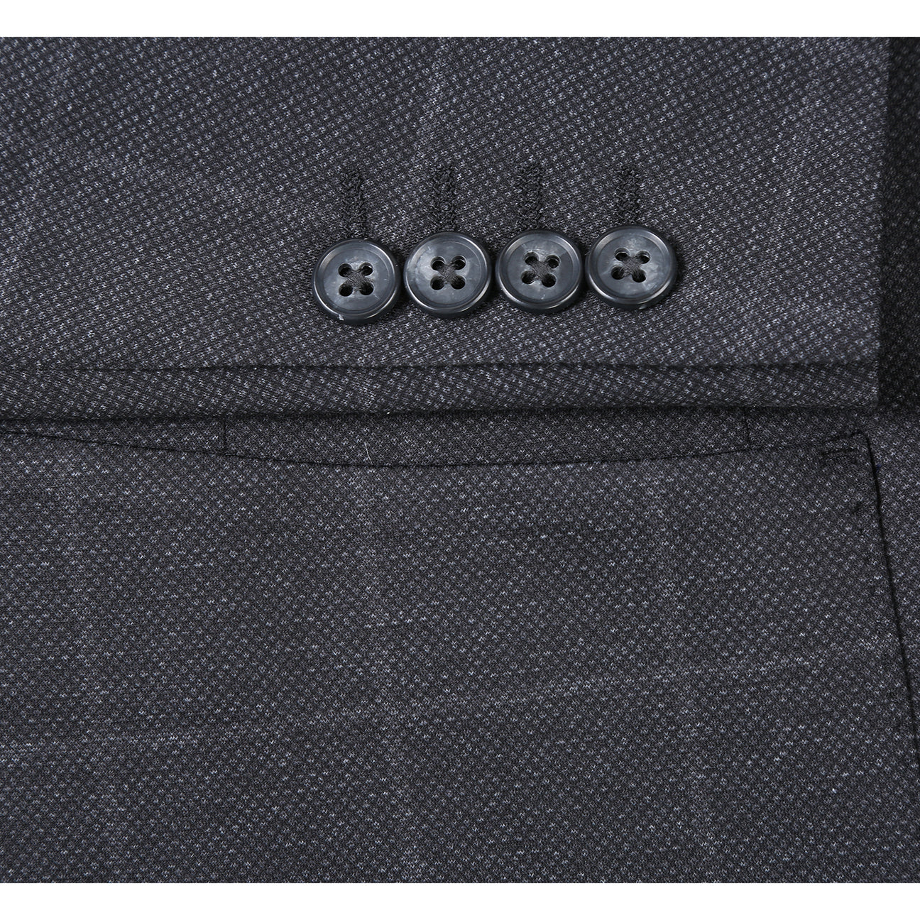 The Pellagio Ink Blue Men's Half Canvas Blazer PF24-7, featuring a single-breasted design and notched lapel, drapes elegantly on the mannequin over a crisp white shirt. A red polka dot tie and patterned pocket square complete the sophisticated ensemble.