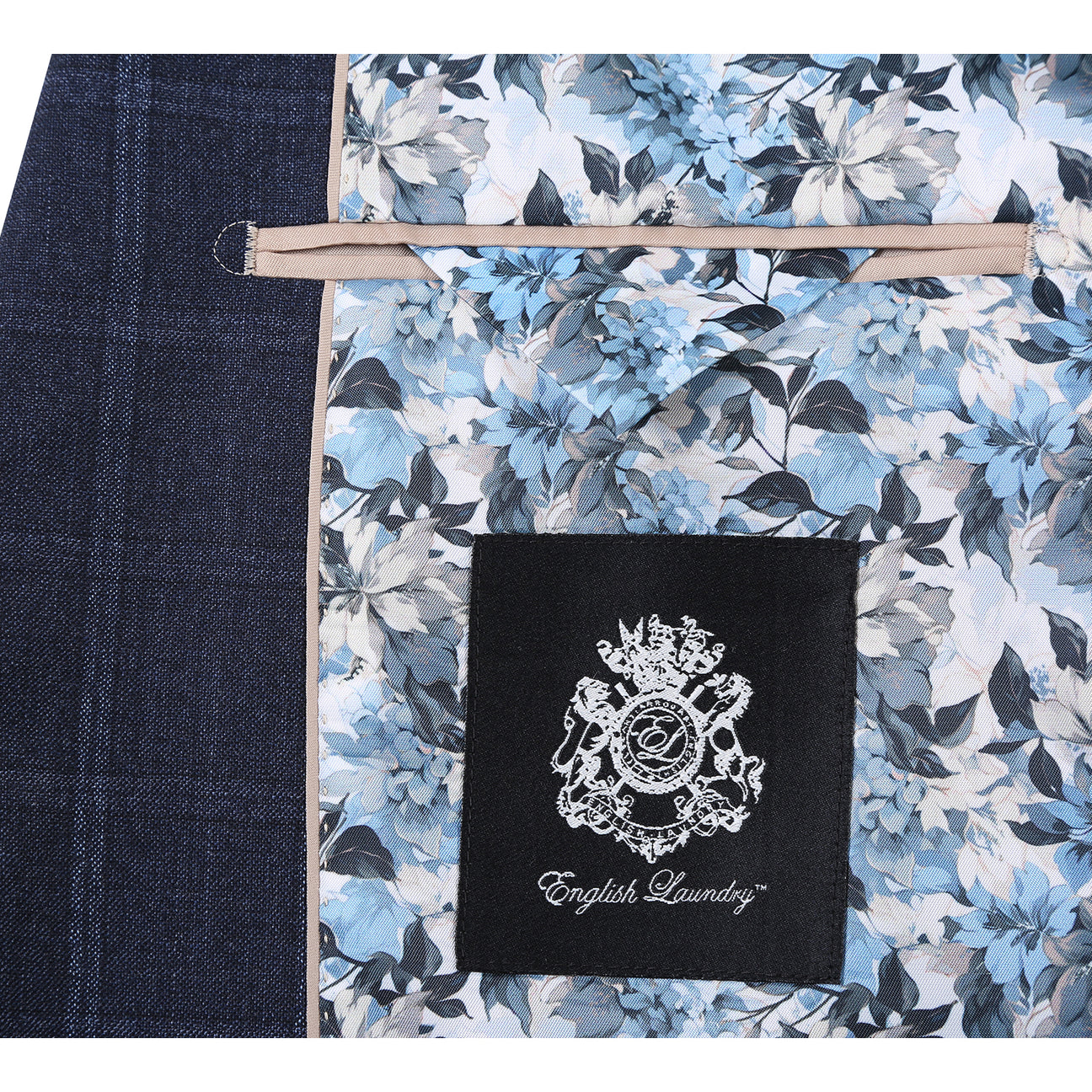 The ENGLISH LAUNDRY Navy Check Suit EL12-52-412 by English Laundry features a modern slim fit, shown here styled on a mannequin with a white dress shirt and striped tie for a sharp contemporary look.