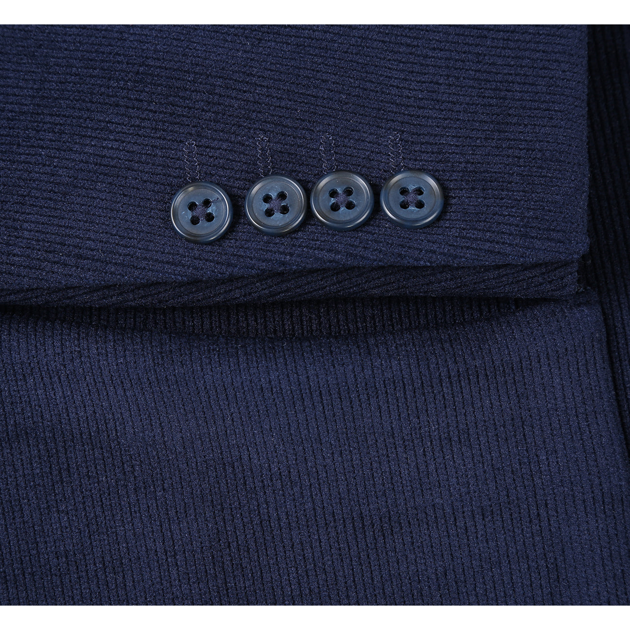 The Pellagio Navy Blue Men's Half Canvas Blazer (PF24-9), featuring a slim fit, single-breasted design, two buttons, and notched lapel, is paired with a crisp white shirt and red polka dot tie. It includes two front pockets and a stylish patterned pocket square.