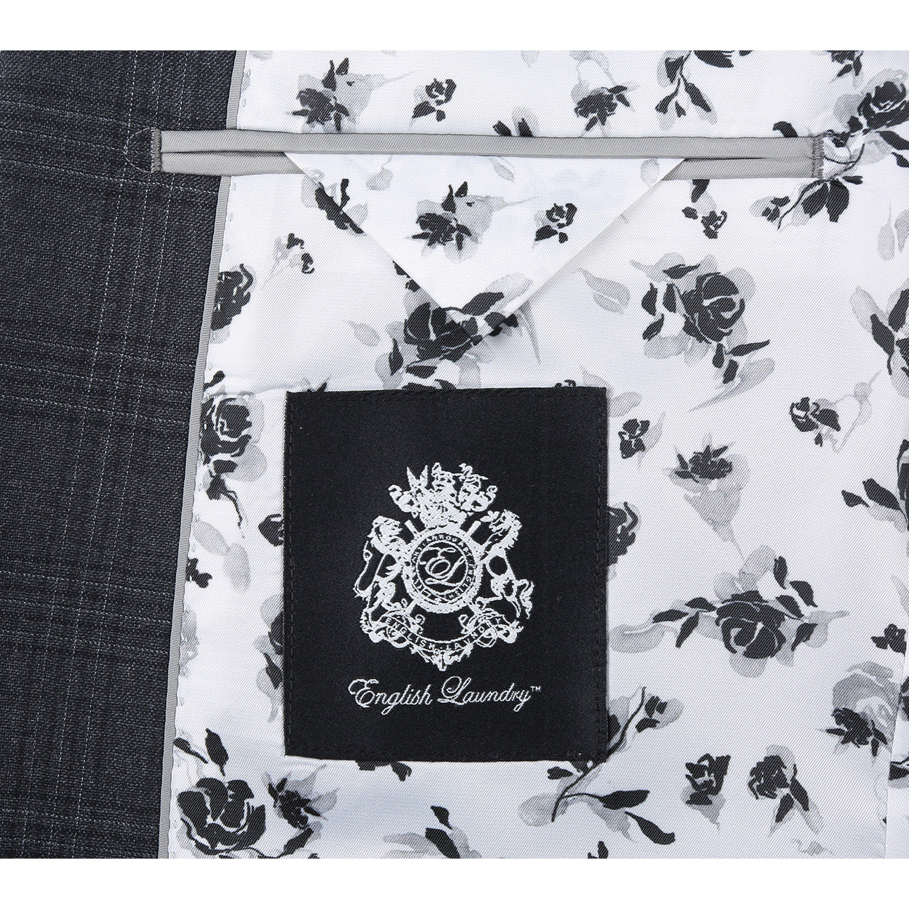 The ENGLISH LAUNDRY Dark Gray Check Suit EL12-58-095 by English Laundry is shown on a mannequin, styled with a white dress shirt and striped tie for a timeless men's suit ensemble.