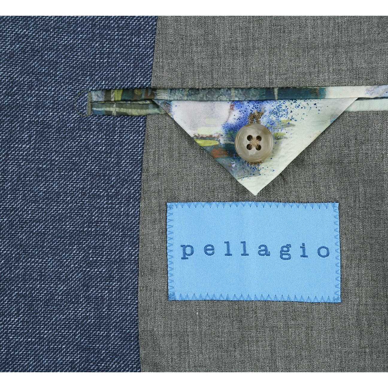 The Pellagio Navy Men's Half Canvas Blazer PS24-3 by Pellagio is a slim fit suit jacket featuring a floral lining, matching tie, and pocket square. It's crafted from 86% polyester, 9% rayon, and 5% spandex, with a buttoned front, notched lapel, single-breasted design, and blue interior accents.