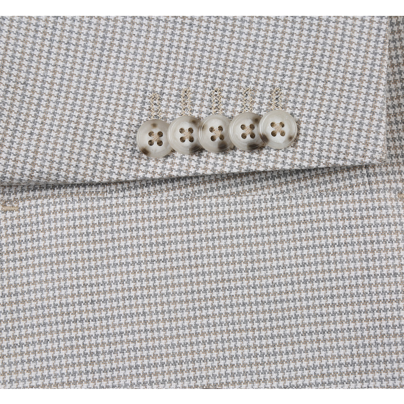 The English Laundry Smoke Grey Check Suit 12-20-600EL features a light gray slim fit jacket with a two-button closure, patch pockets, and is styled with a white shirt and striped red, black, and beige tie on a torso mannequin.