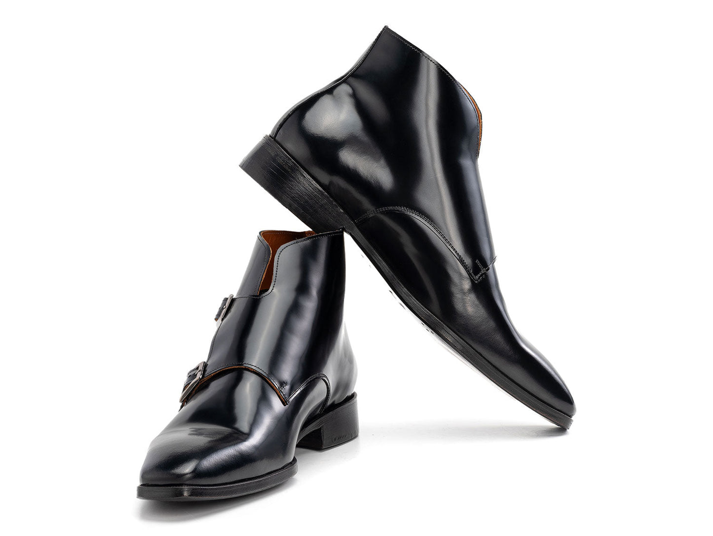The Paul Parkman Double Monkstrap Ankle Boots in black polished leather (model 8154-BLP) feature side buckles; one men's boot stands upright while the other is balanced on top.