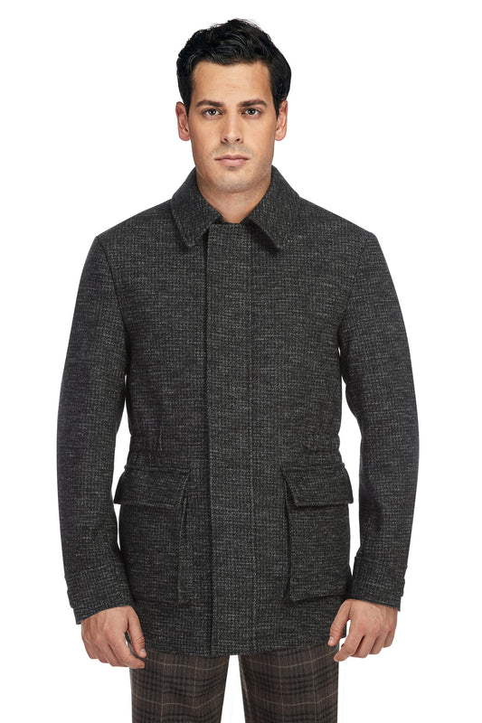 A man wearing the Alessandro Vitello ALESSANDRO VITELLO Short Coat 830-6, a dark grey single-breasted wool blend jacket with front flap pockets and a standing collar, stands against a plain white background.