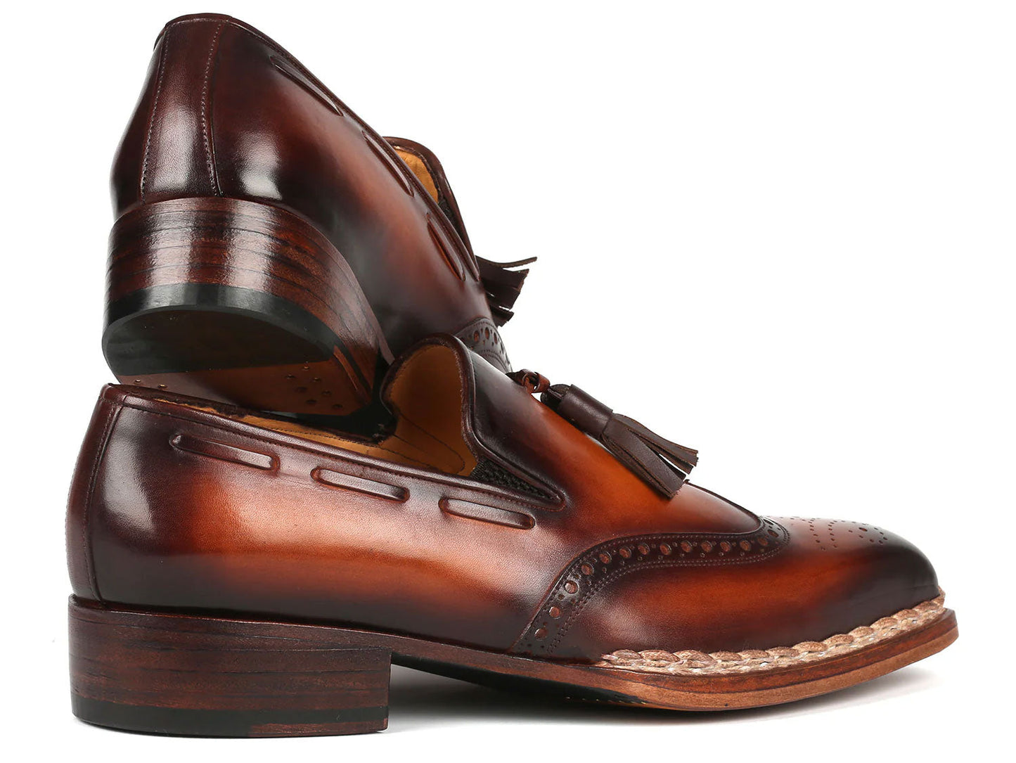 Paul Parkman Norwegian Welted Tassel Loafers Brown Burnished (8507-BRW), handcrafted from hand-painted leather with decorative perforations, braided trim, and stacked heels, shown on a white background.
