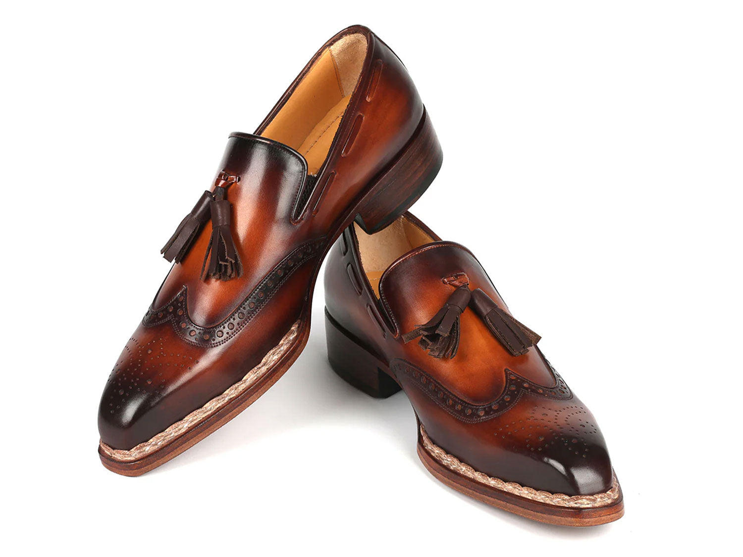 Paul Parkman Norwegian Welted Tassel Loafers Brown Burnished (8507-BRW), handcrafted from hand-painted leather with decorative perforations, braided trim, and stacked heels, shown on a white background.