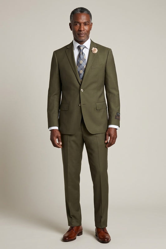 A mannequin displays the Tiglio Luxe Novello Olive Suit from Tiglio, featuring a European fit and accompanied by a white shirt, patterned tie, and a beige floral lapel pin.