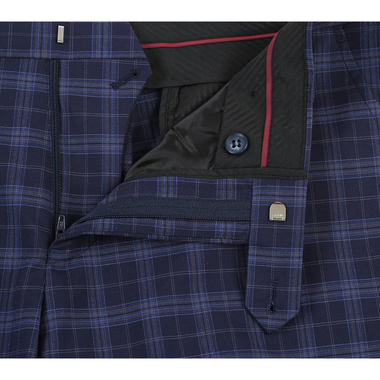 The Alessandro Vitello by Renoir slim fit suit jacket in navy, with a two-button closure, is showcased on a mannequin with a white shirt and maroon polka dot tie, made from a stylish blend of polyester, rayon, and spandex.
