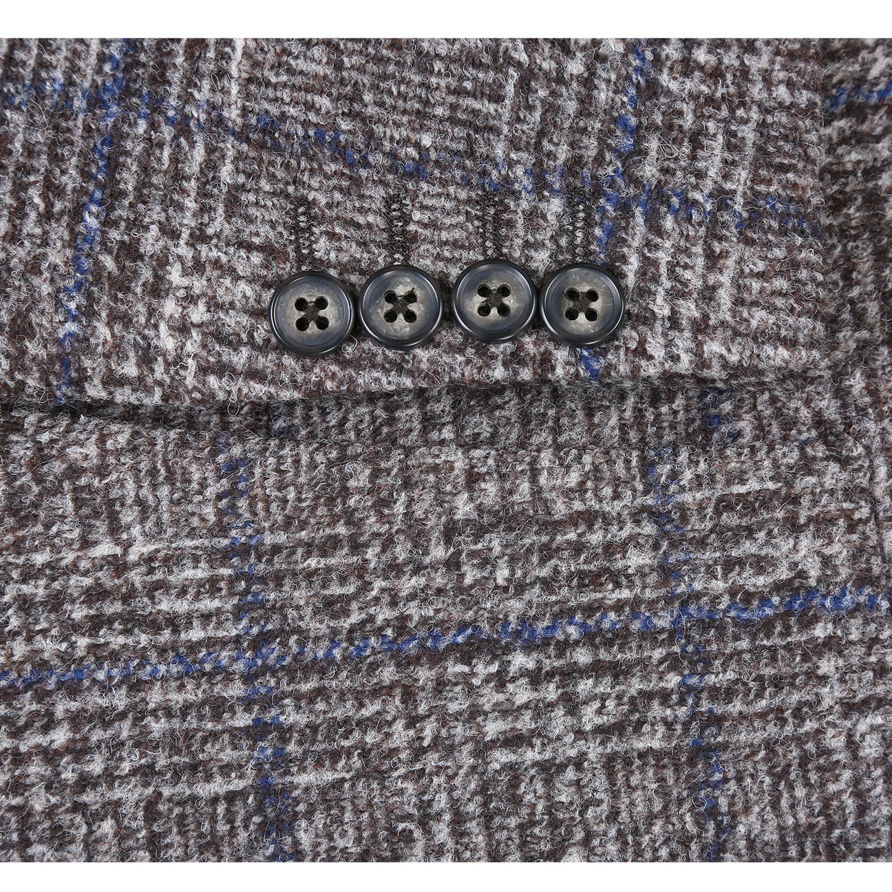 A mannequin showcases a Pellagio Beige Men's Half Canvas Blazer PF24-14, paired with a crisp white shirt and blue tie. A matching blue pocket square is elegantly tucked into the chest pocket for added sophistication.