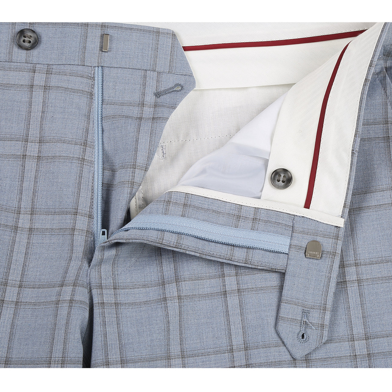 The Renoir Alessandro Vitello Blue 293-40 slim fit suit jacket, paired with a white shirt and red patterned tie, is elegantly displayed on a mannequin.