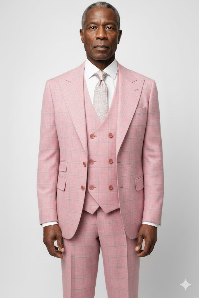 The Tiglio Rosso Orvietto Semi Wide Leg Rouge/Tan Windowpane TL8300 is a 100% wool three-piece suit by Tiglio Rosso, featuring a blazer, vest, and trousers in pink plaid, shown on a white background.