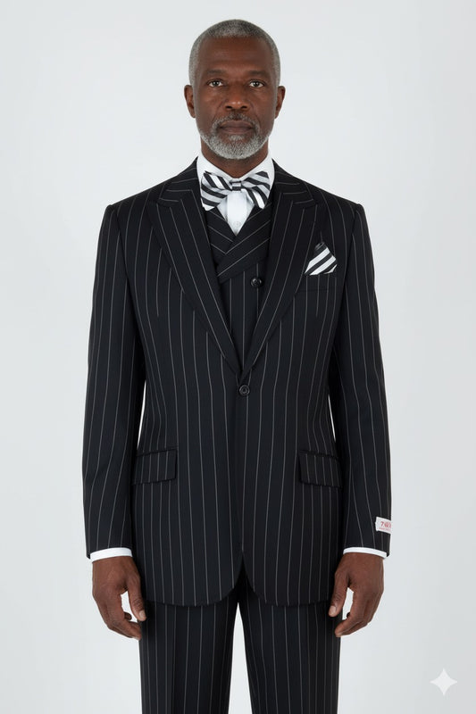 The Tiglio Rosso San Giovesse Black Pinstripe TIG1052 is elegantly displayed on a mannequin, showcasing a sophisticated three-piece ensemble complete with a matching vest and striped bow tie. Crafted from 100% wool, this suit exudes timeless style and sophistication.