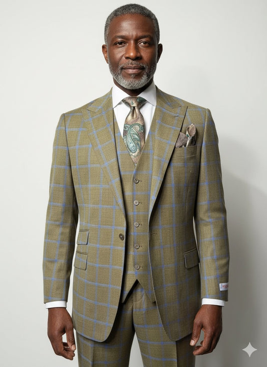 A tailored mannequin showcases the Tiglio Rosso Portofino Semi Wide Leg TL8068 suit in tan checkered 100% wool with matching vest, tie, and pocket square, set against a wall with abstract shadow patterns.