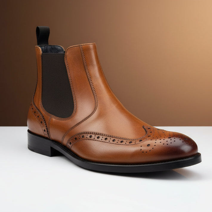 Introducing the Firmani Michael Men’s Shoes Calf-Skin Leather Boot (FINAL SALE) in size 11.5—crafted from rich brown calf-skin leather, featuring brogue detailing, a black elastic side panel, and a low heel. Displayed on a white surface with a brown gradient background, this elegant clearance boot by Firmani makes a sophisticated addition to any men’s footwear collection.