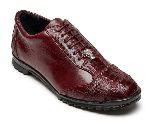 The Los Altos ZEUS Wine Ostrich Leg shoe boasts an exotic cutout design and is adorned with a silver embellishment on top, crafted from luxurious ostrich leg leather.