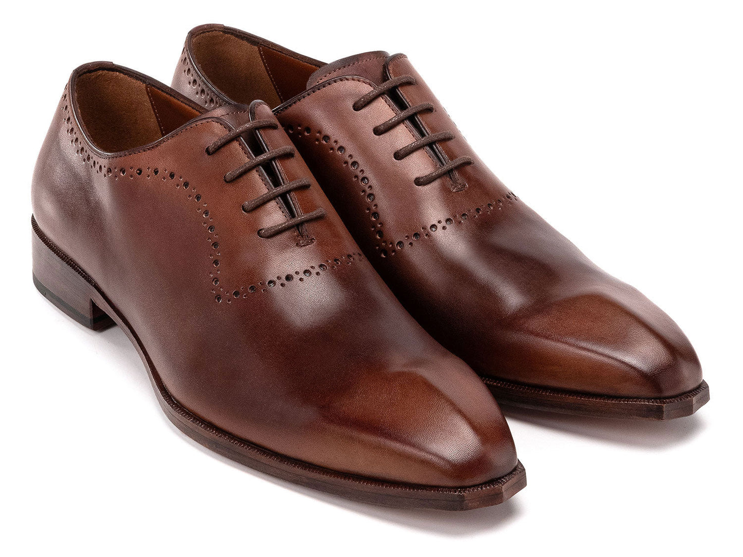 The Paul Parkman Antique Brown Oxfords (AG444BRW) are men's handmade oxford shoes crafted from brown calfskin leather with closed lacing and decorative perforations, shown against a white background.