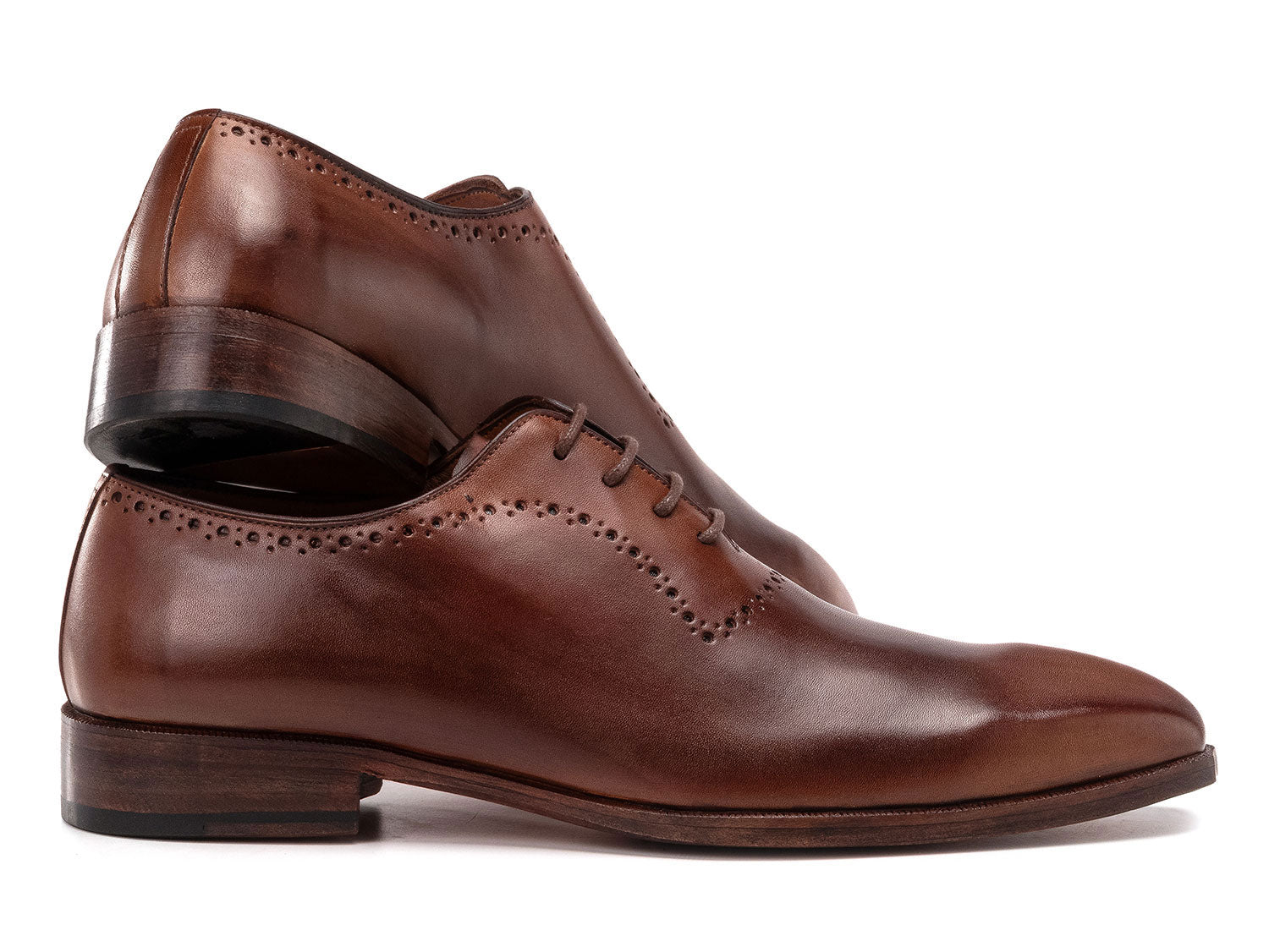 The Paul Parkman Antique Brown Oxfords (AG444BRW) are men's handmade oxford shoes crafted from brown calfskin leather with closed lacing and decorative perforations, shown against a white background.