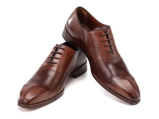 The Paul Parkman Antique Brown Oxfords (AG444BRW) are men's handmade oxford shoes crafted from brown calfskin leather with closed lacing and decorative perforations, shown against a white background.
