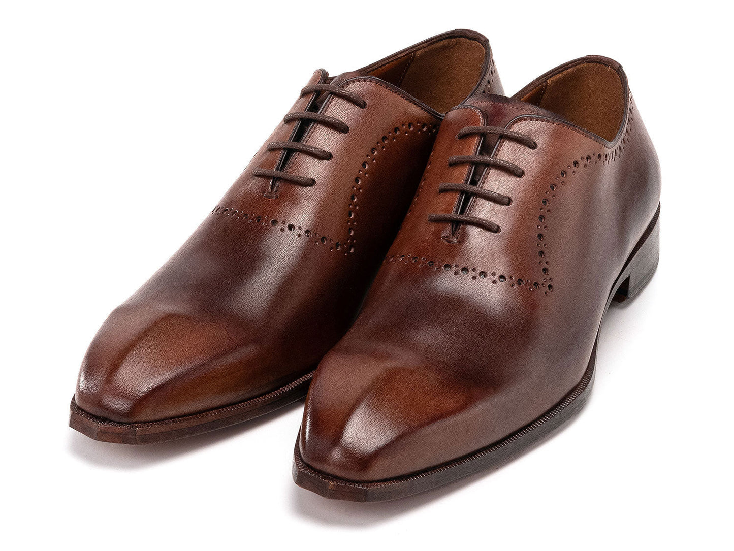 The Paul Parkman Antique Brown Oxfords (AG444BRW) are men's handmade oxford shoes crafted from brown calfskin leather with closed lacing and decorative perforations, shown against a white background.