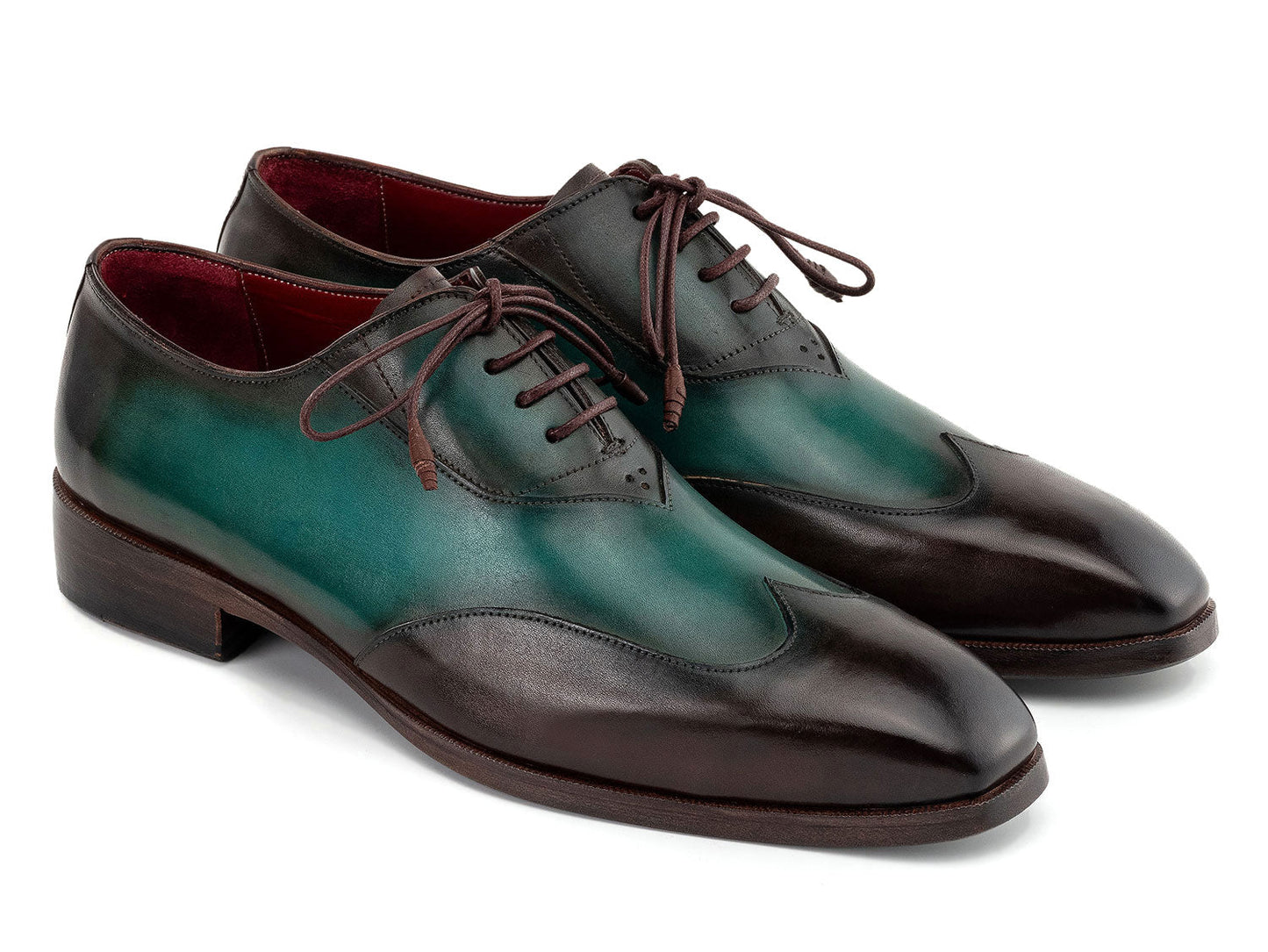The Paul Parkman Brown & Green Patina Leather Wingtip Oxford Shoes (AL3257SJ) feature a hand-painted green and brown leather finish, brown laces, and dark brown soles.