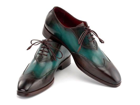 The Paul Parkman Brown & Green Patina Leather Wingtip Oxford Shoes (AL3257SJ) feature a hand-painted green and brown leather finish, brown laces, and dark brown soles.