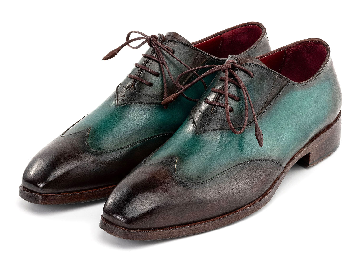 The Paul Parkman Brown & Green Patina Leather Wingtip Oxford Shoes (AL3257SJ) feature a hand-painted green and brown leather finish, brown laces, and dark brown soles.