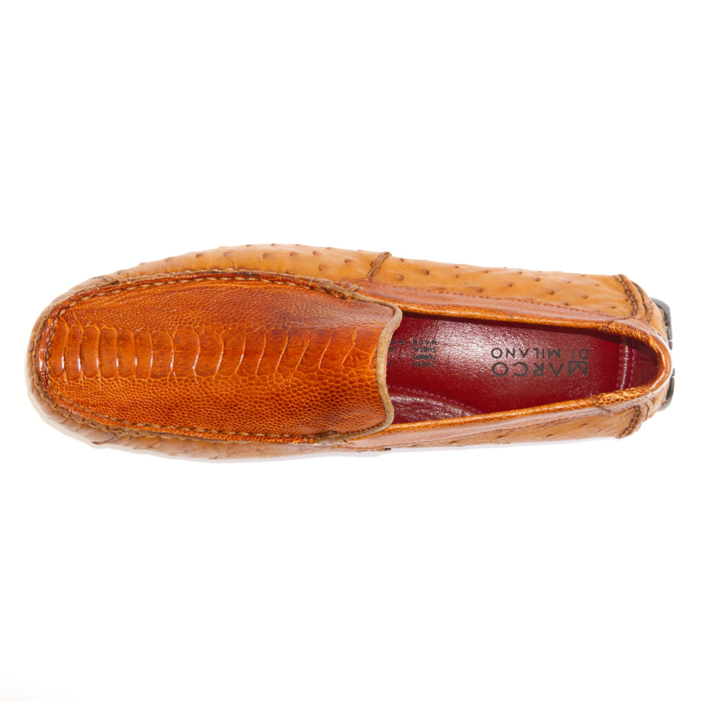 A pair of Alba Brandy luxury moccasin loafers by Marco Di Milano, crafted from genuine tan ostrich leather with a distinctive textured surface and black rubber soles—one shoe displayed upright and the other shown lying on its side.