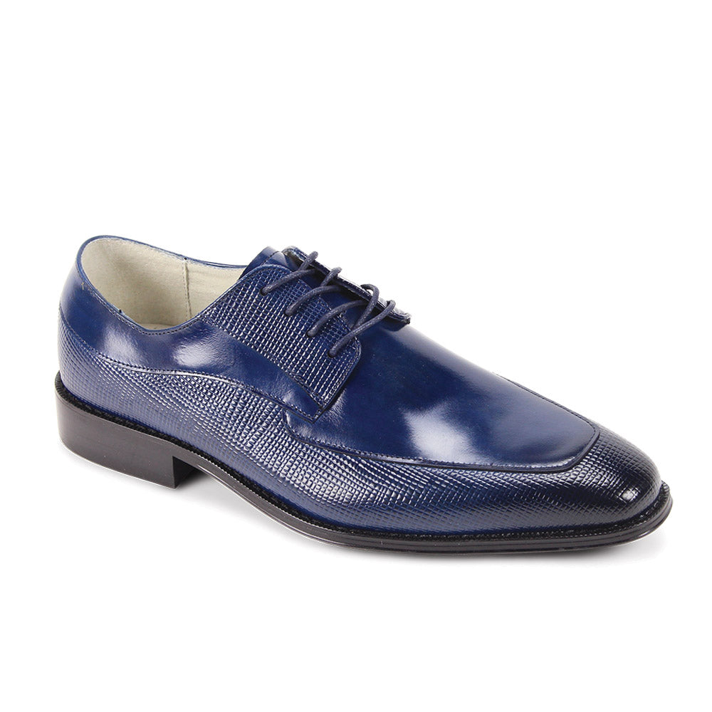 The Giovanni Asher Cobalt Leather Shoe by GIOVANNI features blue embossed leather, side texture, laces, moc toe detailing, and a low black heel.